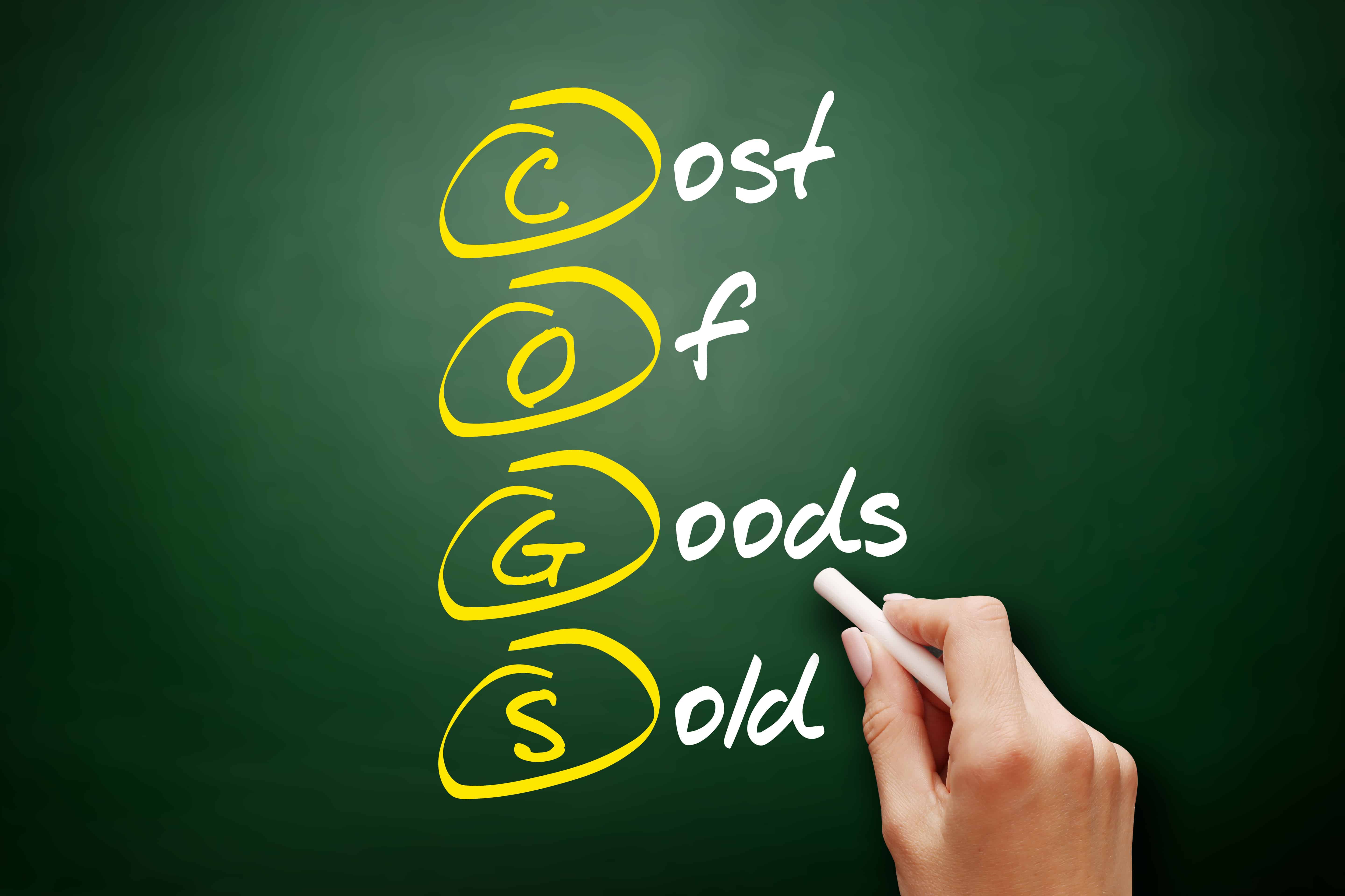 COGS - Cost of Goods Sold acronym, business concept on blackboard